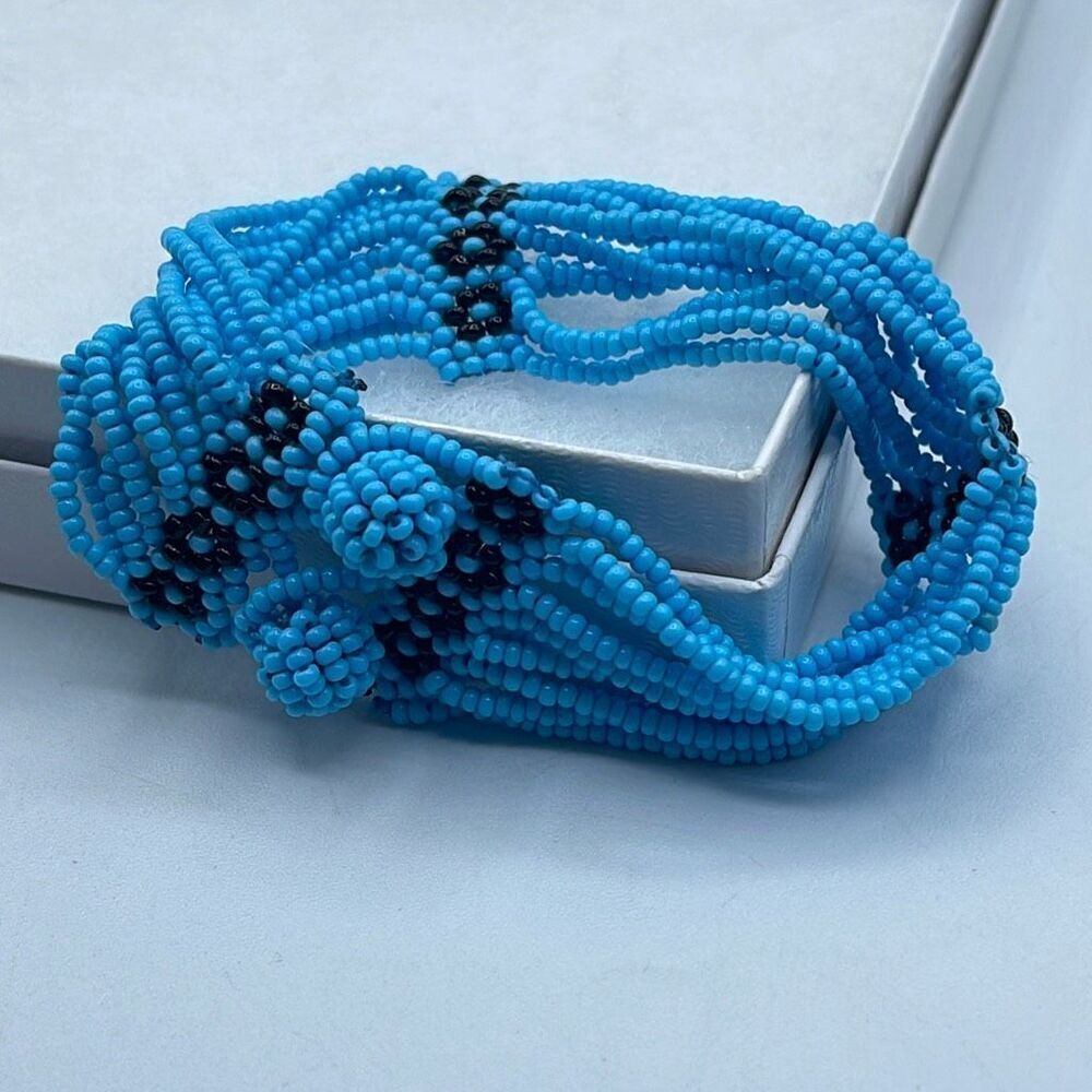 Artisan made seed beaded layered bracelet.